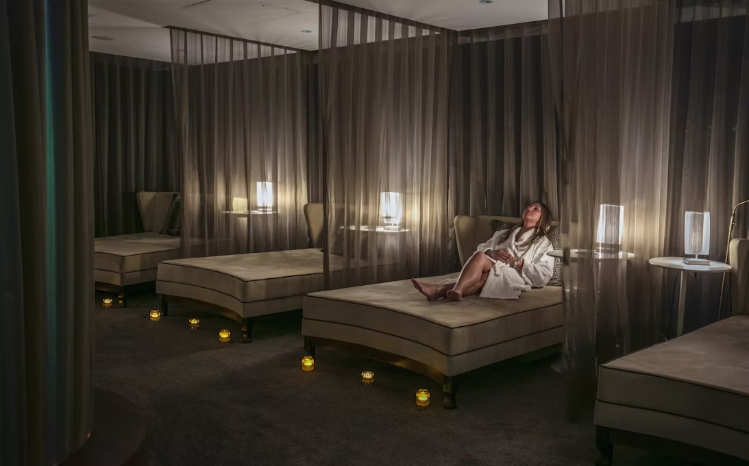 A guest relaxing in the Suites Hotel Spa relaxation room